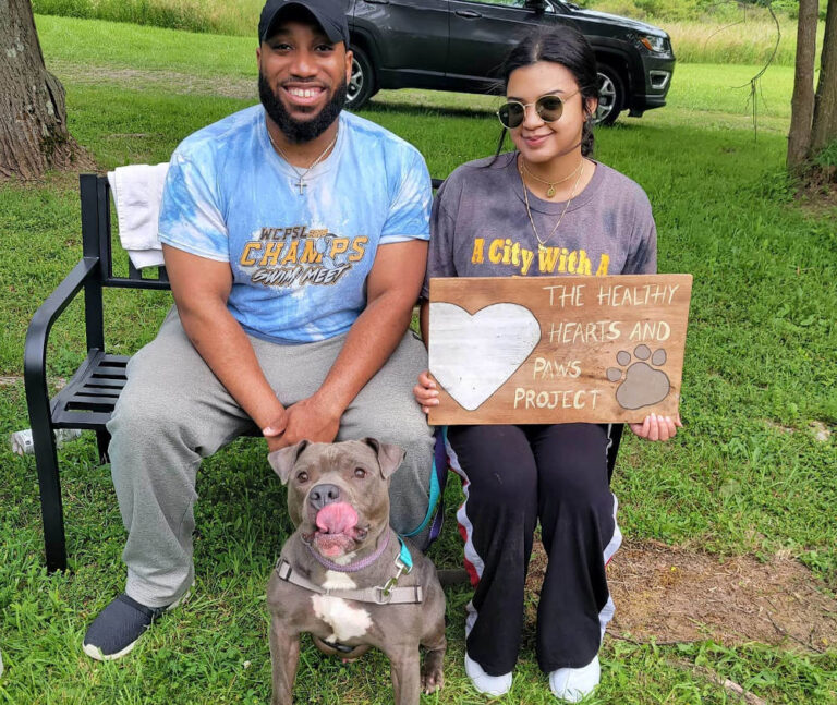 couple with sign